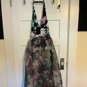 Bebe size 4, beautiful floral print dress with organza material.NEW NEVER WORN